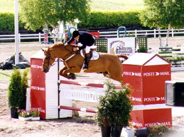 Photo d'Éric Lamaze sur le vertical Postes Canada